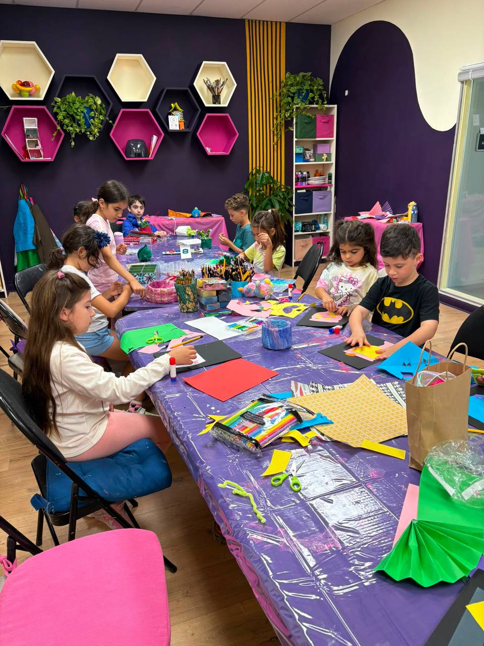 Children working on craft projects at weekend art camp in Richmond Hill